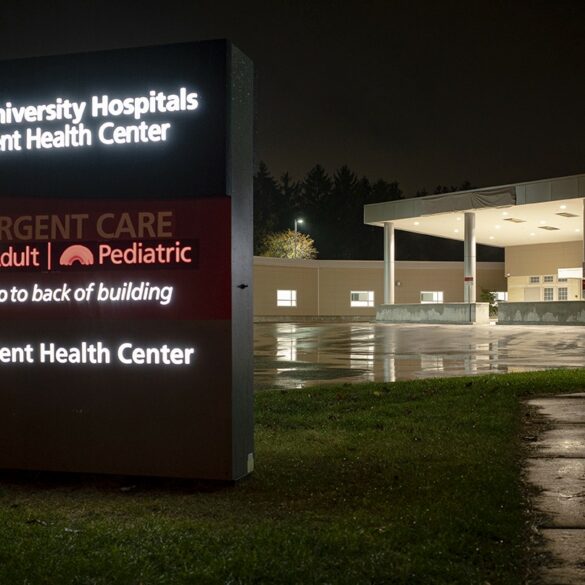 Image of the front of a hospital facility at night