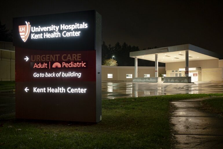 Image of the front of a hospital facility at night