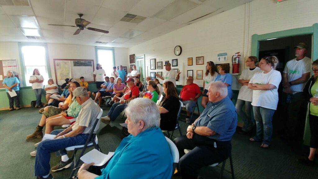 Image of dozens of residents at Freedom Town Hall